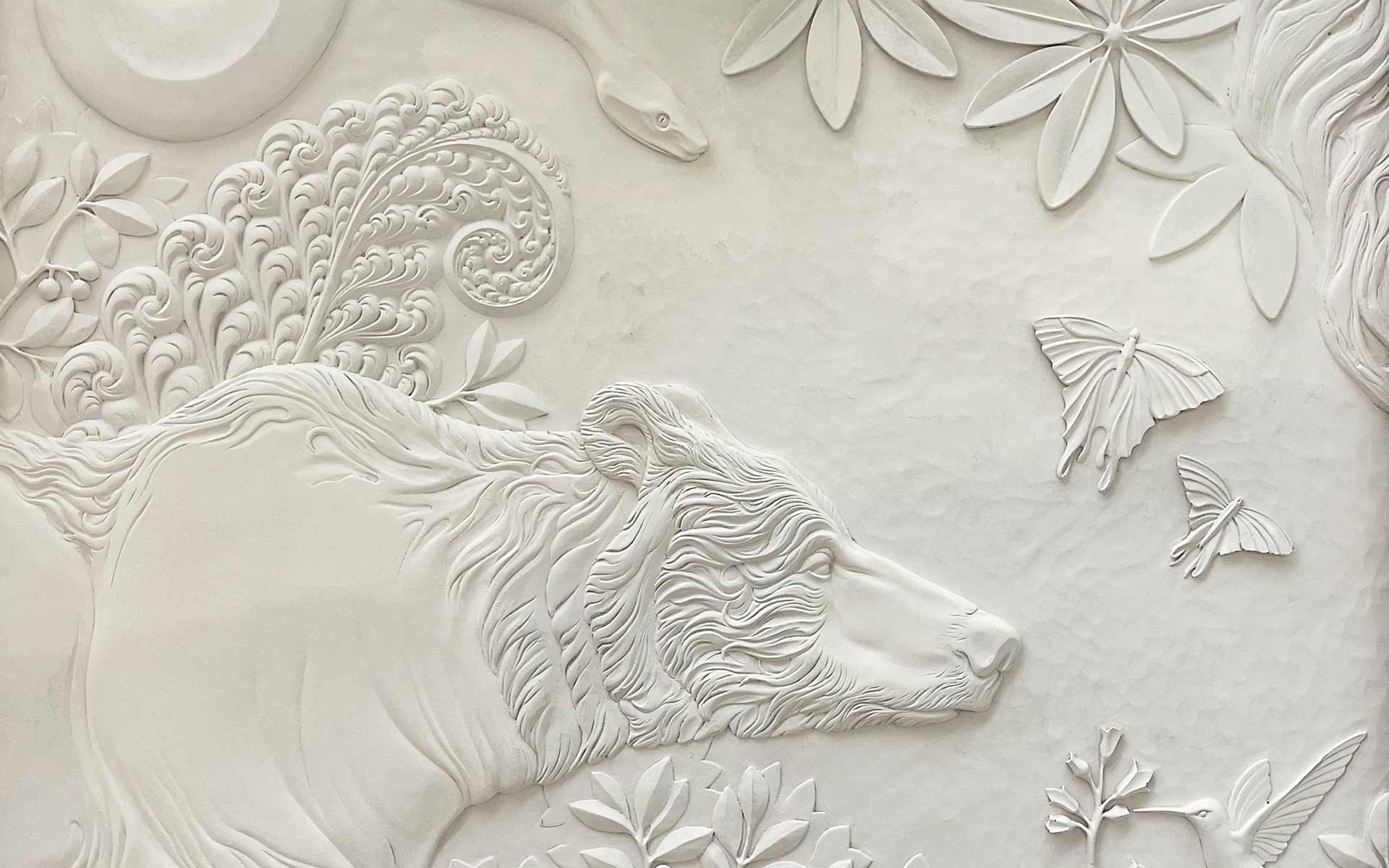 Stone finish bas-relief 'Flora and Fauna'. Project by M Design. Photo by DKT Artworks.