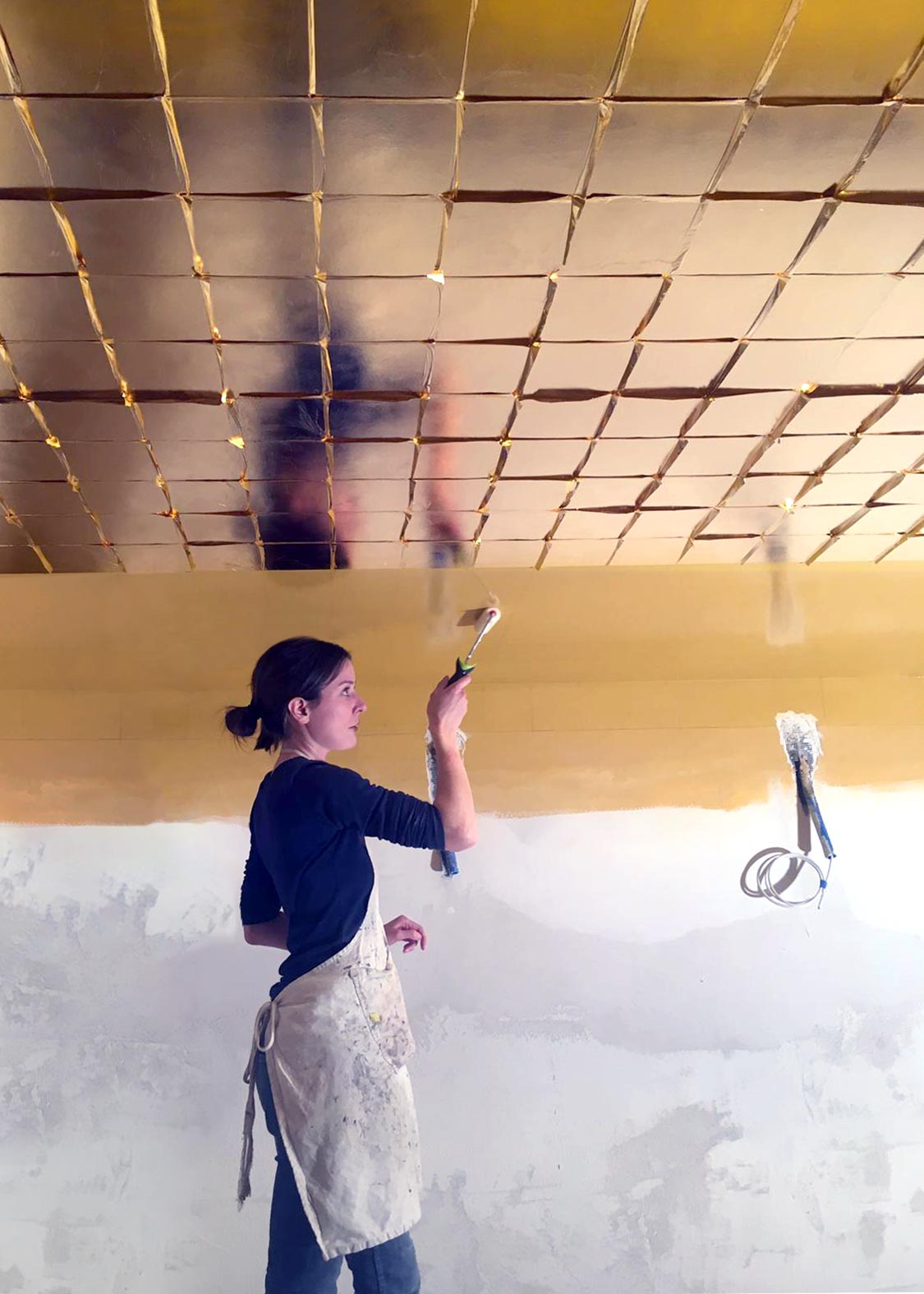 Preparing surface and applying size to ceiling before gilding | Photo: DKT Artworks