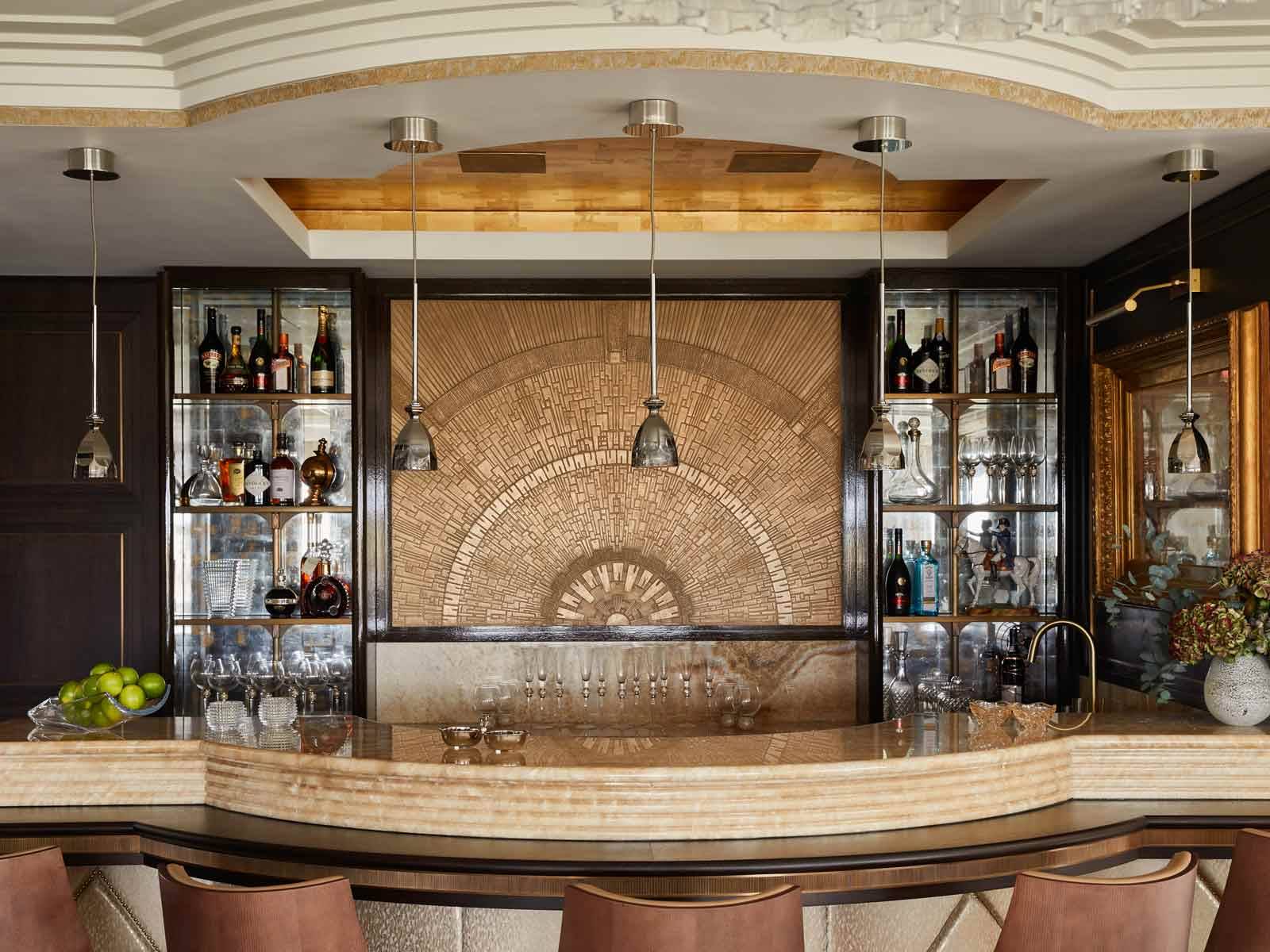 Art Deco design bas-relief in a metal finish to back of bar area | DESIGN: Sara Cosgrove Studio | PHOTO: © Helen Cathcart